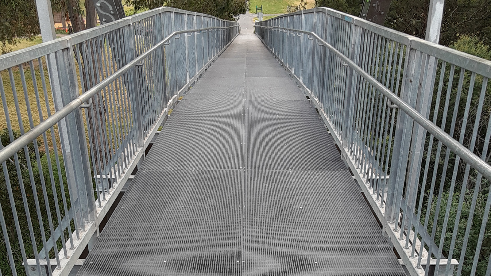 FRP bridge with steel railings.