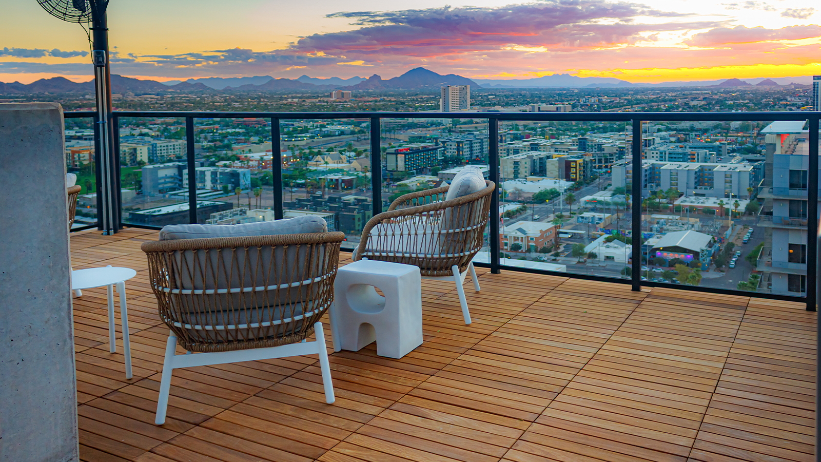 Ipe deck with clear glass balcony at sunset in arizona.