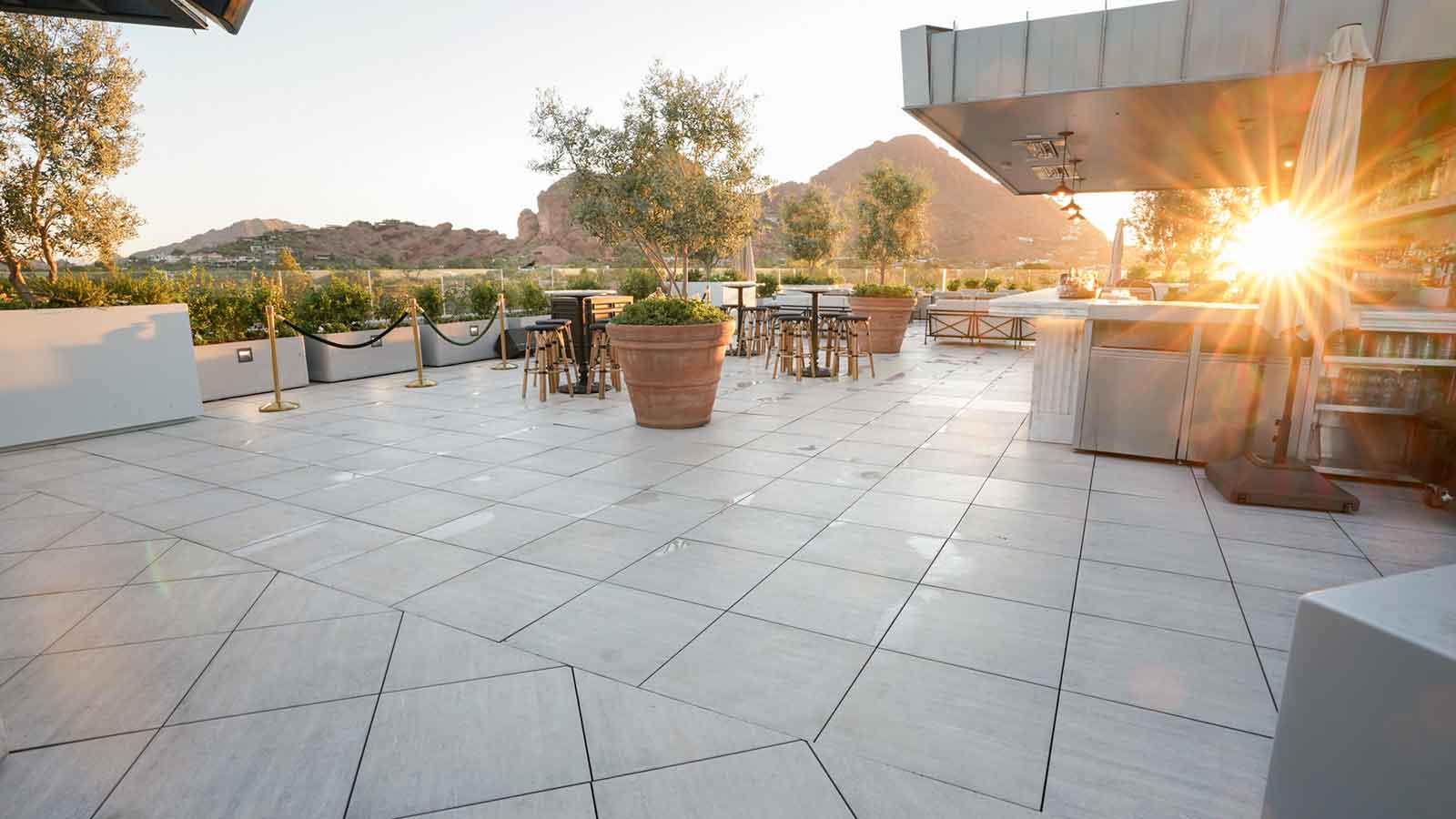 Travertine porcelain pavers on hotel roof deck in Phoenix, Arizona. 