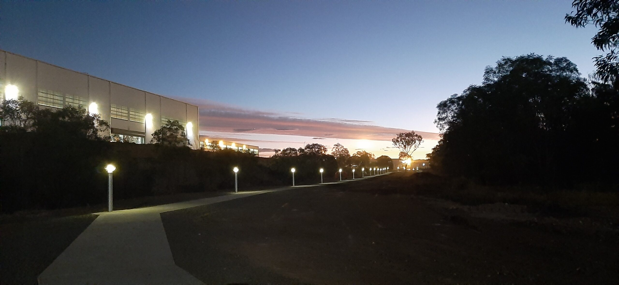 sbl bollards on long path at dusk. 