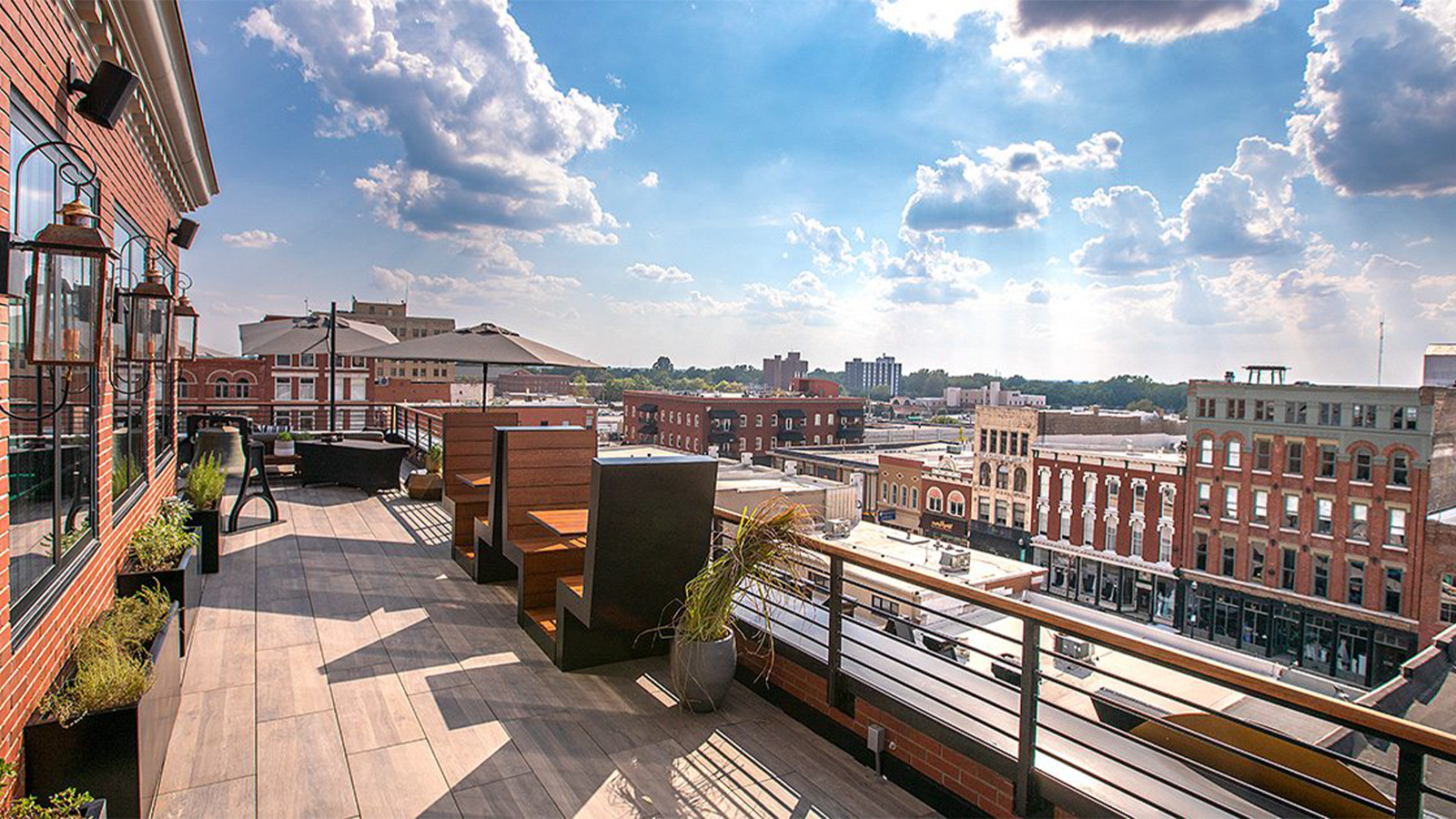 roofdecck of hotel vandivort with sunny skies and city views.