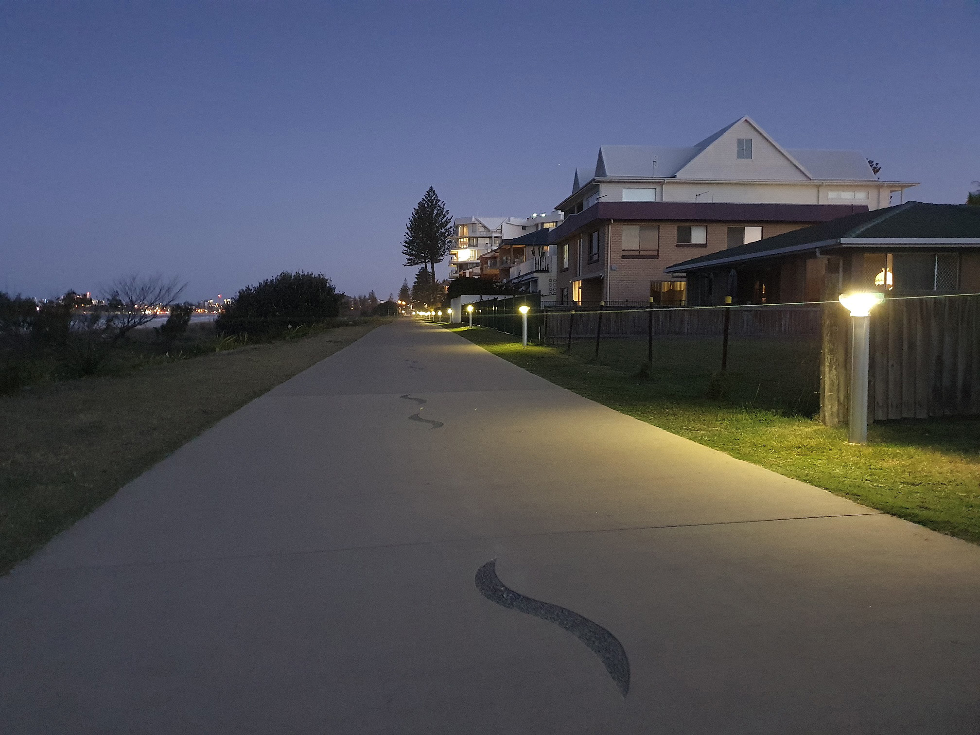 solar bollards at dusk on residential path