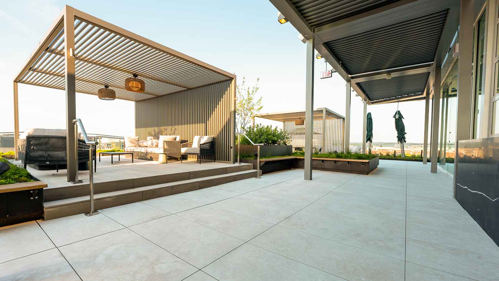 porcelain paver and pedestal roof deck with small elevated gazebo area.