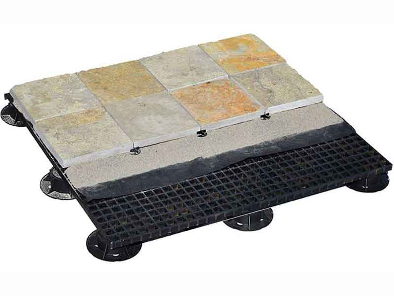 unguaged stone over sand over frp panels