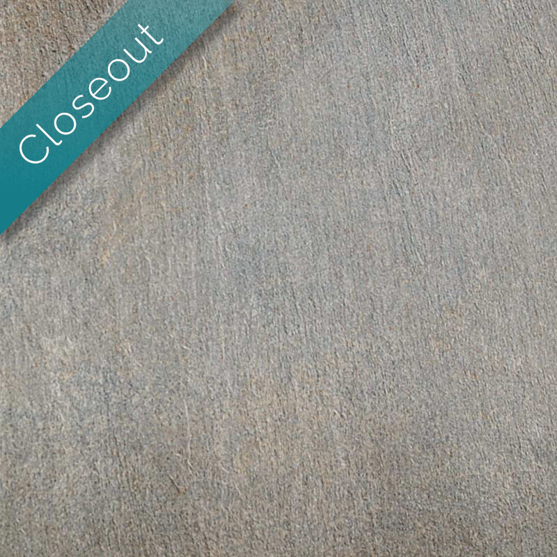 mid grey and brown porcelain paver with closeout ribbon in upper left.