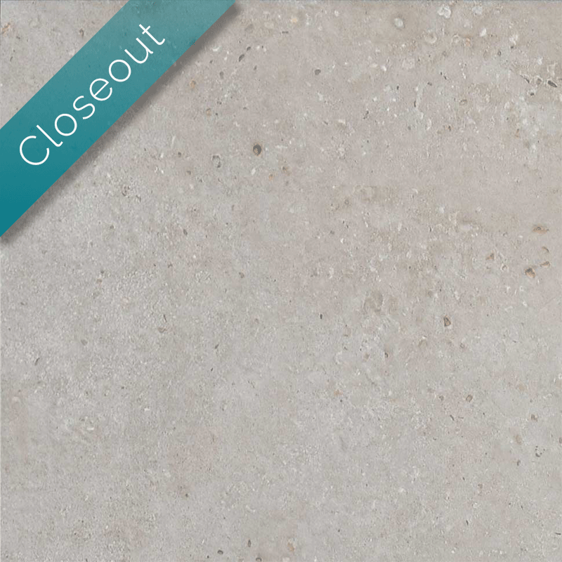 silver cement look porcelain paver with closeout ribbon in upper left.
